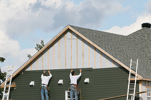 Professional Vinyl Siding technician working in Butler, IN